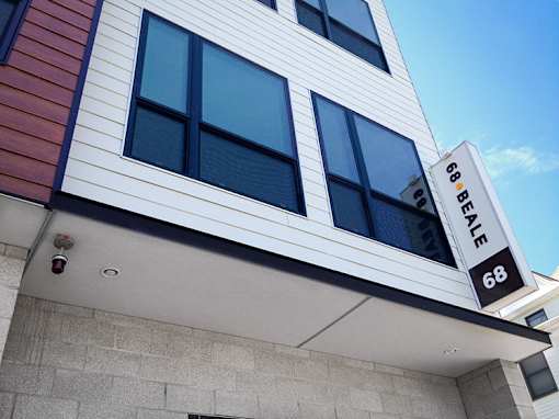Property entrance sign and modern building facade at 68 Beale Apartments, Quincy, MA 02169
